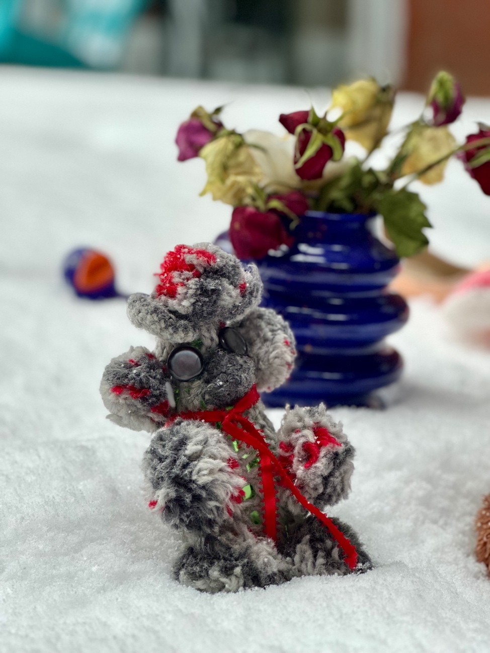 A stuffed animal in the snow
AI-generated content may be incorrect.