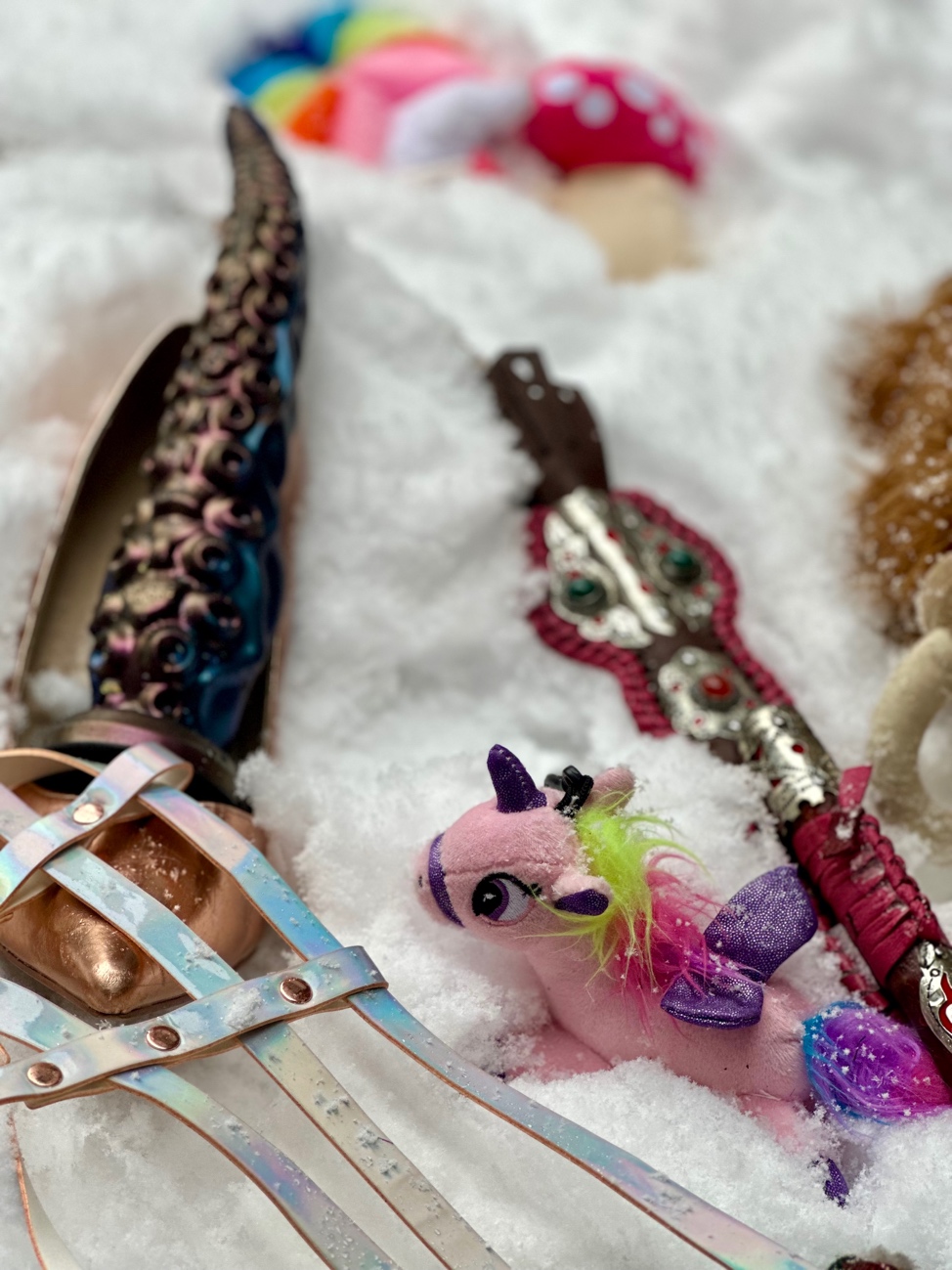 A group of toys in the snow
AI-generated content may be incorrect.