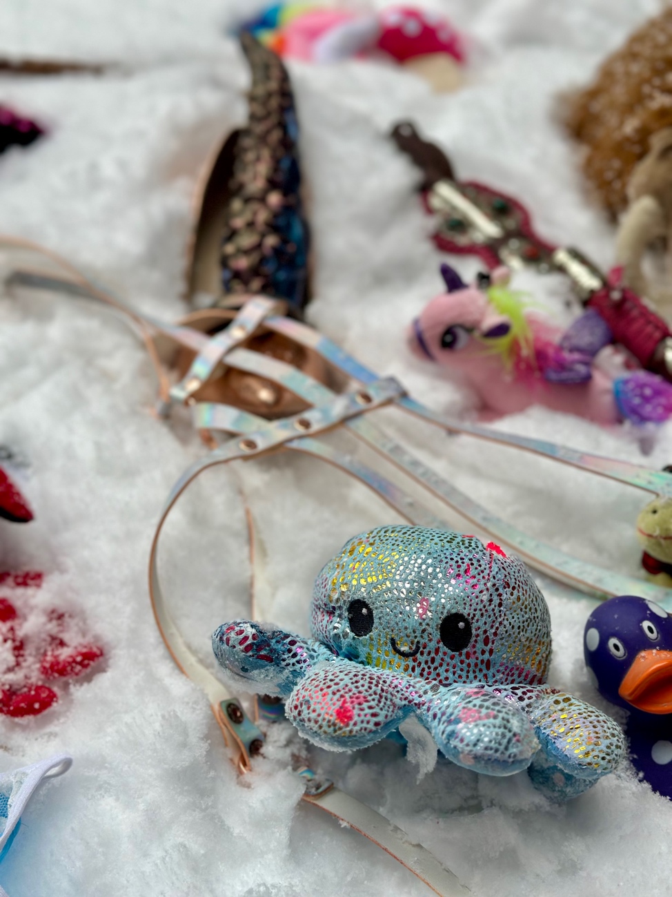 A group of toys on a white surface
AI-generated content may be incorrect.