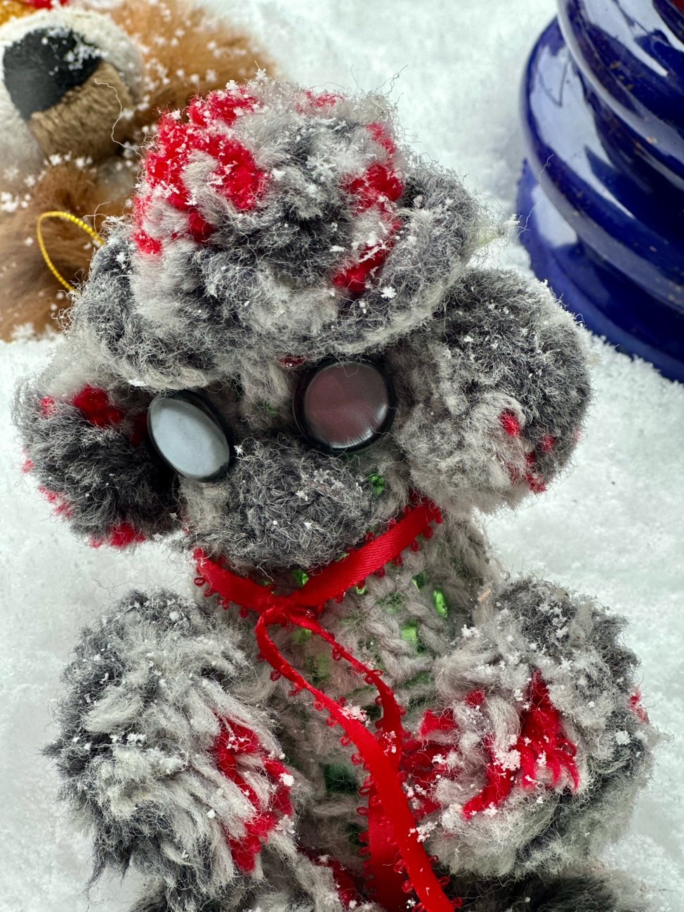 A stuffed animal in the snow
AI-generated content may be incorrect.