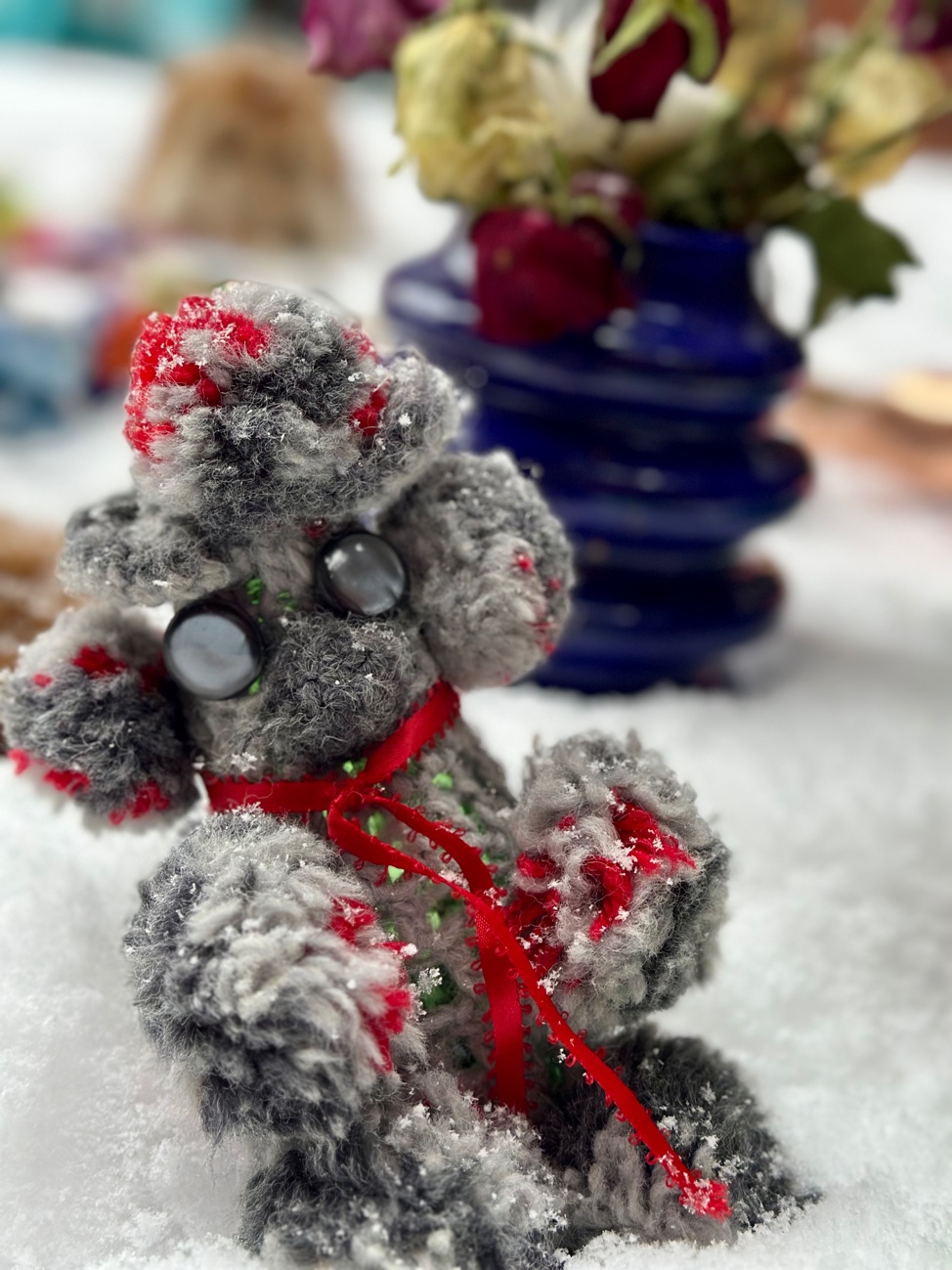 A stuffed animal in the snow
AI-generated content may be incorrect.