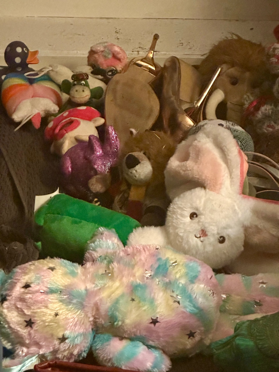 A pile of stuffed animals
AI-generated content may be incorrect.